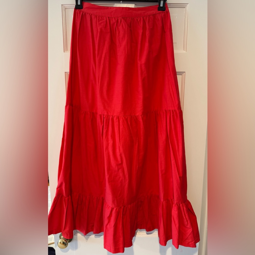 Beautiful fun long reddish colored skirt.